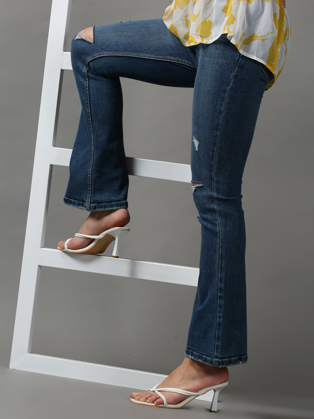 Women's Blue Bootcut Mildly Distressed Light Fade Denim Jeans